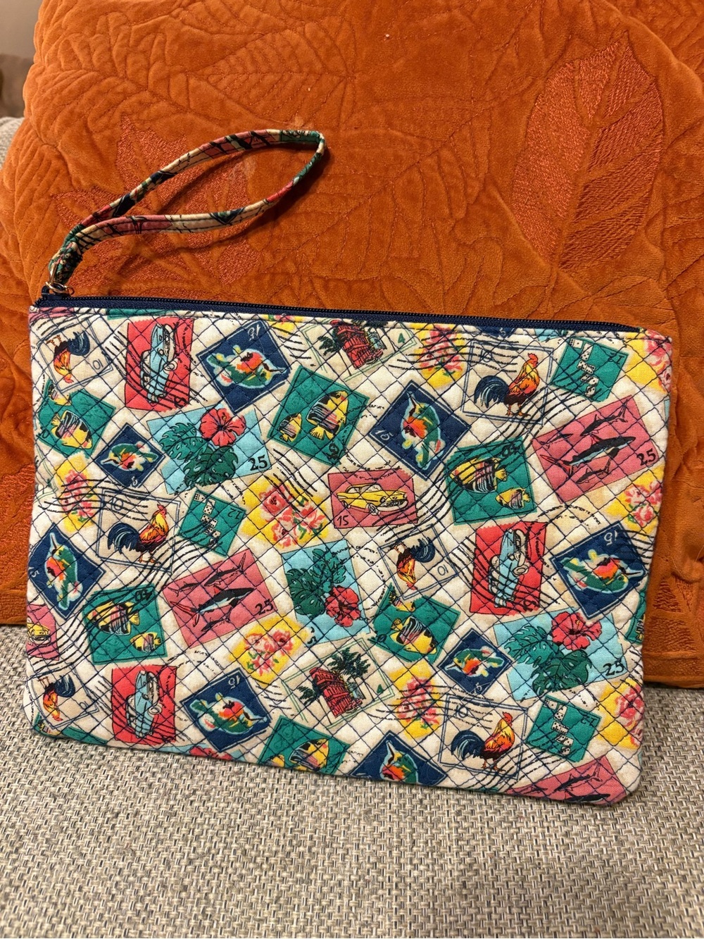 Vera Bradley Quilted Wristlet in a Colorful Travel Print of stamps